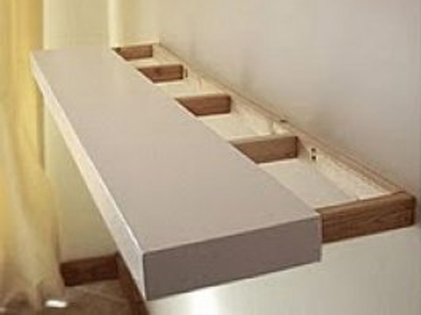 Como instalar un estante en una pared de yeso de tu casa